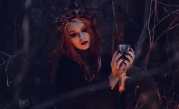 Woman in dark forest